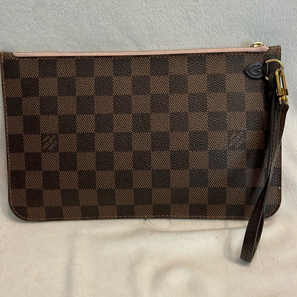 Louis Vuitton ebene wristlet clutch in good condition